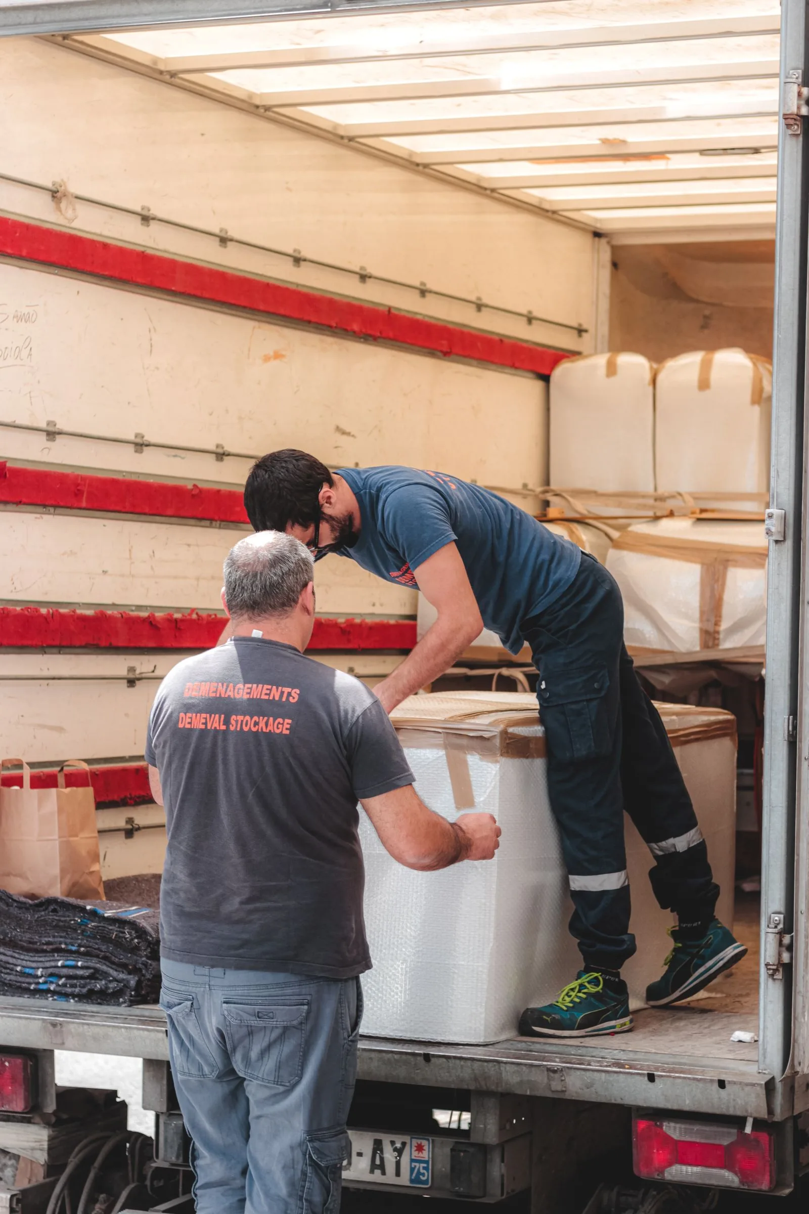 Junk removal crew loading a truck in Reno, NV